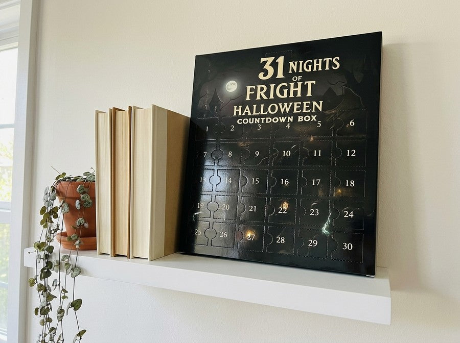 The box on the shelf, next to books for scale